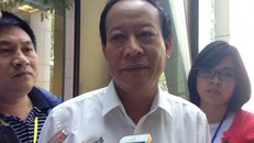 Thượng tướng Lê Quý Vương, Thứ trưởng Công an trả lời báo chí bên hành lang Quốc hội. Ảnh: Vinh An