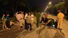 Ô tô kéo lê bé trai 100m rồi bỏ chạy