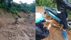 Thầy cô vượt đường ngập bùn nửa bánh xe, đưa chữ lên non