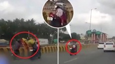 Bố mẹ văng xuống đất sau tai nạn, con nhỏ vẫn ngồi trên xe máy phóng vun vút