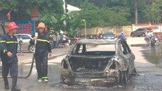 Chiếc xe bị cháy rụi chỉ còn trơ phần khung - Ảnh: Giáo dục Thời đại