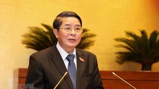 Chủ nhiệm Ủy ban Tài chính, Ngân sách của Quốc hội Nguyễn Đức Hải trình bày Báo cáo giải trình, tiếp thu, chỉnh lý dự án Luật Đầu tư công (sửa đổi). (Ảnh: Phương Hoa/TTXVN)