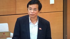 Tổng Thư ký Quốc hội, Chủ nhiệm Văn phòng Quốc hội Nguyễn Hạnh Phúc trình bày dự thảo Báo cáo. Ảnh: VGP/Nguyễn Hoàng