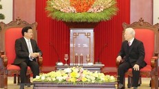 Tổng Bí thư, Chủ tịch nước Nguyễn Phú Trọng tiếp Tổng Bí thư, Thủ tướng Lào Thongloun Sisoulith nhân dịp sang Việt Nam dự Kỳ họp lần thứ 43 Ủy ban liên Chính phủ Việt - Lào về hợp tác song phương tháng 12/2020. Ảnh TTXVN