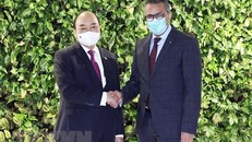 Chủ tịch nước Nguyễn Xuân Phúc gặp Tổng Giám đốc Tổ chức Y tế Thế giới Tedros Adhanom Ghebreyesus. (Ảnh: Thống Nhất/TTXVN)