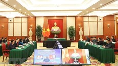 Tổng Bí thư Nguyễn Phú Trọng hội đàm trực tuyến với Chủ tịch Đảng Mặt trận Giải phóng Mozambique, Tổng thống Mozambique Filipe Jacinto Nyusi. (Ảnh: Trí Dũng/TTXVN)