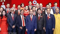 Chủ tịch nước Nguyễn Xuân Phúc với các đại biểu dự Đại hội. (Ảnh: Thống Nhất/TTXVN)