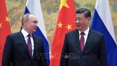 Tổng thống Nga Vladimir Putin (trái) và Chủ tịch Trung Quốc Tập Cận Bình tại cuộc gặp ở Bắc Kinh, ngày 4/2/2022. Ảnh: AFP/TTXVN