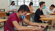 Thí sinh dự thi tốt nghiệp trung học phổ thông. (Ảnh: Phạm Mai/Vietnam+)