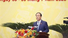 Chủ tịch Hội đồng Nhân dân thành phố Hà Nội Nguyễn Ngọc Tuấn phát biểu khai mạc kỳ họp. (Ảnh: Doãn Tấn/TTXVN)