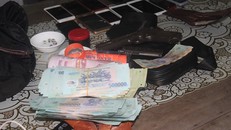 Phá sòng bạc quy mô lớn có trang bị súng trên ngọn đồi hoang vắng