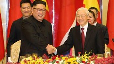 Tổng Bí thư, Chủ tịch nước Nguyễn Phú Trọng chào mừng Chủ tịch Triều Tiên Kim Jong-un. Ảnh: Trí Dũng/TTXVN