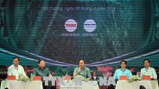 Thủ tướng Nguyễn Xuân Phúc phát biểu tại buổi đối thoại với nông dân Việt Nam với chủ đề "Tháo gỡ vướng mắc, khơi dòng động lực, tiếp đà 30 năm đổi mới” ngày 09/04/2018. Ảnh: Thống Nhất/TTXVN