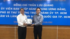 Phó Bí thư Thường trực Thành ủy TP Hồ Chí Minh Trần Lưu Quang (phải) và Giám đốc ĐHQG TP Hồ Chí Minh Huỳnh Thành Đạt tại buổi làm việc năm 2019.