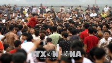 Màn cướp phết tại lễ hội phết Hiền Quan năm 2019. Ảnh: Trung Kiên/TTXVN