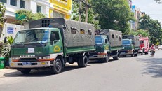 Lực lượng chức năng có mặt và kiểm tra tại tòa nhà nơi Công ty Home Credit đặt trụ sở. (Ảnh: VnExpress) 