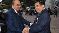 Thủ tướng Nguyễn Xuân Phúc và Bộ trưởng Bộ Kế hoạch và Đầu tư Nguyễn Chí Dũng. Ảnh: VGP/Quang Hiếu 