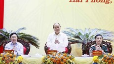 Chủ tịch nước Nguyễn Xuân Phúc chủ trì hội thảo. (Ảnh: Thống Nhất/TTXVN)