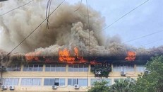 Hiện trường vụ cháy tại ngõ 109 Trường Chinh. (Ảnh: TTXVN phát) 