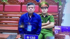 Bị cáo Ngô Văn Thụy tại phiên xét xử. (Ảnh: Lê Xuân/TTXVN)