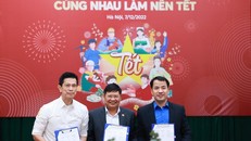 Ký kết thỏa thuận hợp tác, chung tay thực hiện Chương trình "Cùng nhau làm nên Tết”. (Ảnh: PV/Vietnam+)