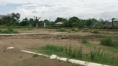 Một dự án bán đất nền bằng hợp đồng góp vốn đầu tư xây dựng nhà ở và hợp đồng hợp tác đầu tư đang nổ ra tranh chấp, nếu chủ đầu tư phá vỡ hợp đồng, mức bồi thường khiến người mua lỗ 30-60 cây vàng. Ảnh: Vũ Lê