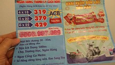 Tờ rơi quảng cáo bán đất ngân hàng thanh lý và cho vay 25 năm. Ảnh: Trung Tín