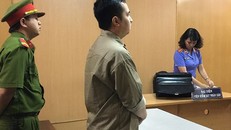 Trần Quốc Bảo tại tòa chiều nay 5/2. Ảnh: Tân Châu