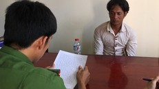 Tuấn tại cơ quan công an. Ảnh: C.A