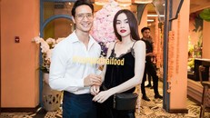 Cặp đôi tay trong tay tại sự kiện, thu hút sự chú ý của truyền thông