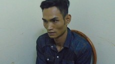  Nghi can sát hại vợ tại cơ quan công an. Ảnh: Hoàng Đoàn.