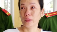 Thủy khóc khi cảnh sát đưa về nhà giam. Ảnh: Việt Tường.