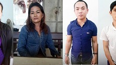 Từ trái qua, Mai, Lan, Lê và Vi tại cơ quan công an.