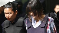 Nghi phạm Đoàn Thị Hương xuất hiện tại tòa sáng nay, 29/1. Ảnh: AP