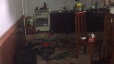 Hiện trường vụ nổ mìn tại nhà nữ giáo viên. Ảnh: Ngân Hà