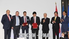 Tổng Bí thư Nguyễn Phú Trọng chứng kiến lễ trao thỏa thuận giữa hãng Hàng không Vietjet Air và Tập đoàn SAFRAN-CFN Ảnh: TTXVN