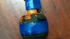 Quả lựu đạn thu giữ tại đám cưới. Ảnh: Công an cung cấp.