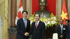 Chủ tịch nước Trần Đại Quang và Thủ tướng Justin Trudeau. Ảnh: Lao Động