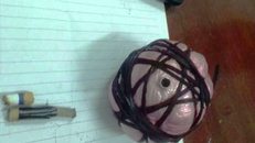 Quả mìn tự chế được phát hiện dưới gầm xe. Ảnh: PLO