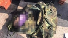 Thi thể bé trai được phát hiện trong ba lô. Ảnh: Thanh Niên