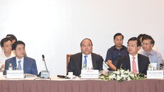 Thủ tướng Nguyễn Xuân Phúc tại diễn đàn Kinh tế Tư nhân Việt Nam. Ảnh: VGP/Quang Hiếu