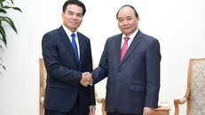 Thủ tướng Nguyễn Xuân Phúc tiếp Bộ trưởng, Chủ nhiệm Văn phòng Phủ Thủ tướng Lào Phet Phomphiphak.