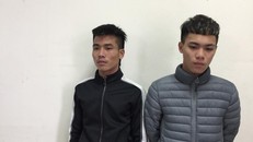 Cường và Hưng tại cơ quan công an. (Ảnh: Linh Anh)