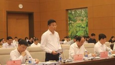 Bộ trưởng Bộ Tư pháp Lê Thành Long giải trình trước Ủy ban Pháp luật của Quốc hội. (Nguồn: moj.gov.vn)