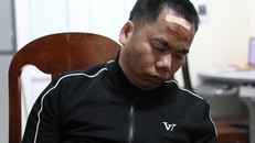 Nghi phạm Luyện tại cơ quan công an. Ảnh: Dân Việt