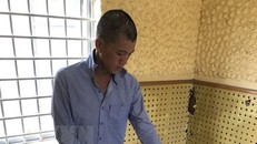 Đối tượng Nguyễn Hồng Tài tại cơ quan điều tra. (Nguồn: TTXVN)