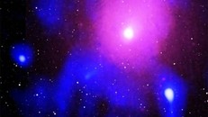 Ảnh chụp vụ nổ hố đen siêu lớn trong cụm thiên hà Ophiuchus. (Ảnh: CNN).