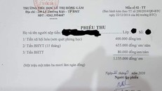 Mỗi học sinh đóng 400.000 đồng để sơn quét phòng học. Ảnh: T.N.