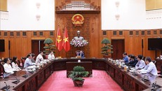 Thủ tướng Phạm Minh Chính chủ trì cuộc họp về đảm bảo cân bằng thương mại với Hoa Kỳ. Ảnh: Dương Giang/TTXVN.