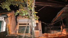 Ảnh: Sau tiếng nứt gãy, hàng loạt nhà cao tầng đổ xuống Sông Đà